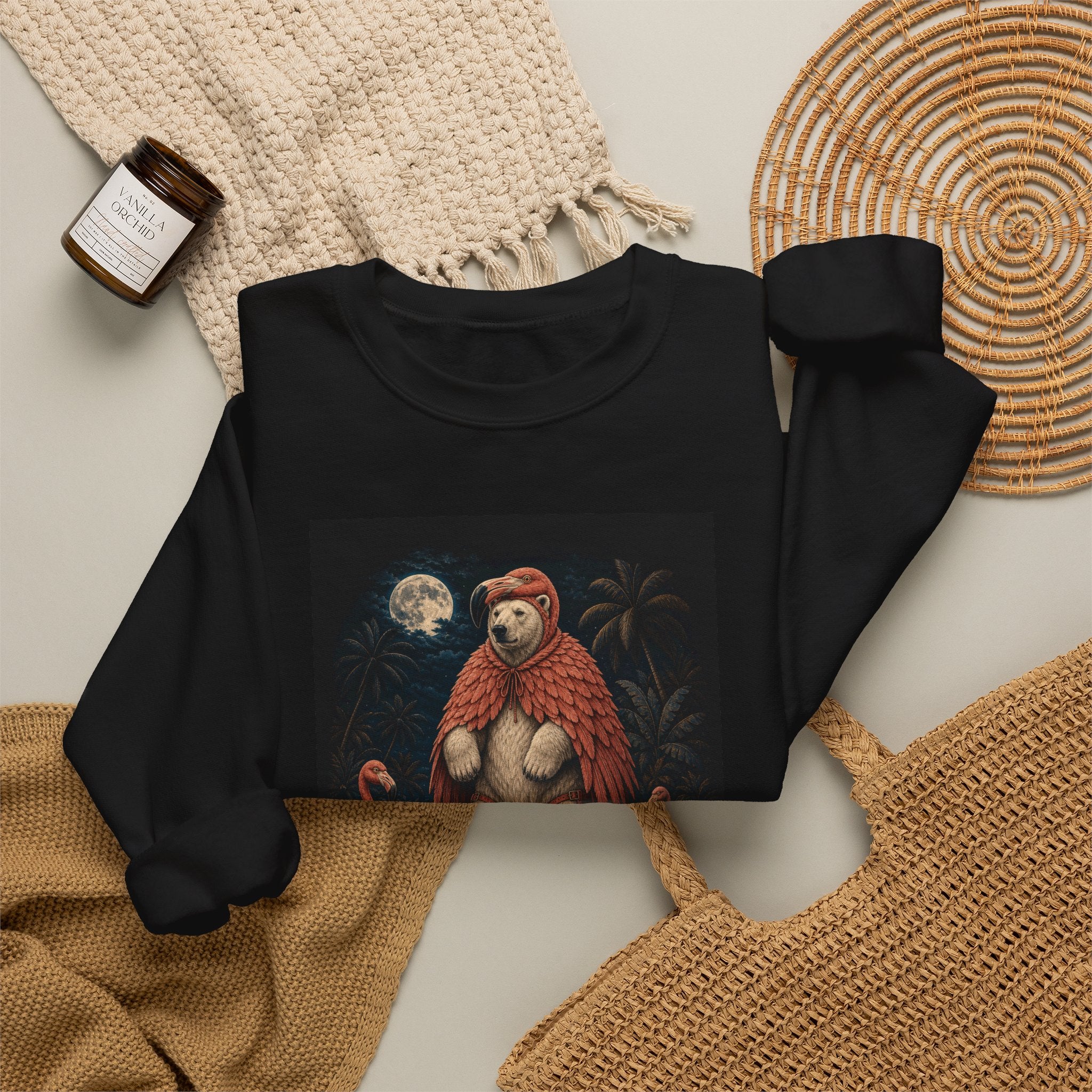 Polar bear in flamingo feathers design shown on a black crewneck sweatshirt, Wrong Habitat