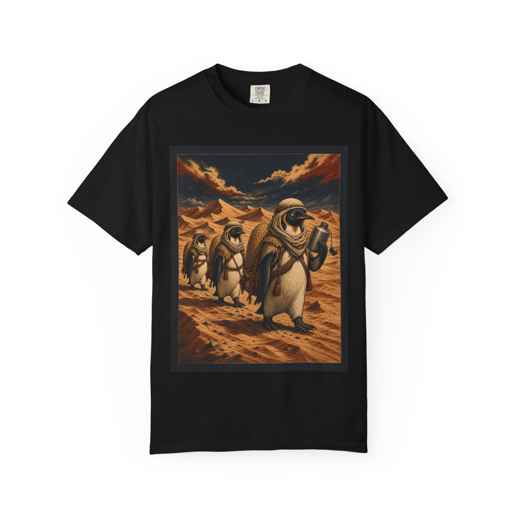 Penguin desert t-shirt: three emperor penguins crossing sand in strapped-on camel humps, black tee