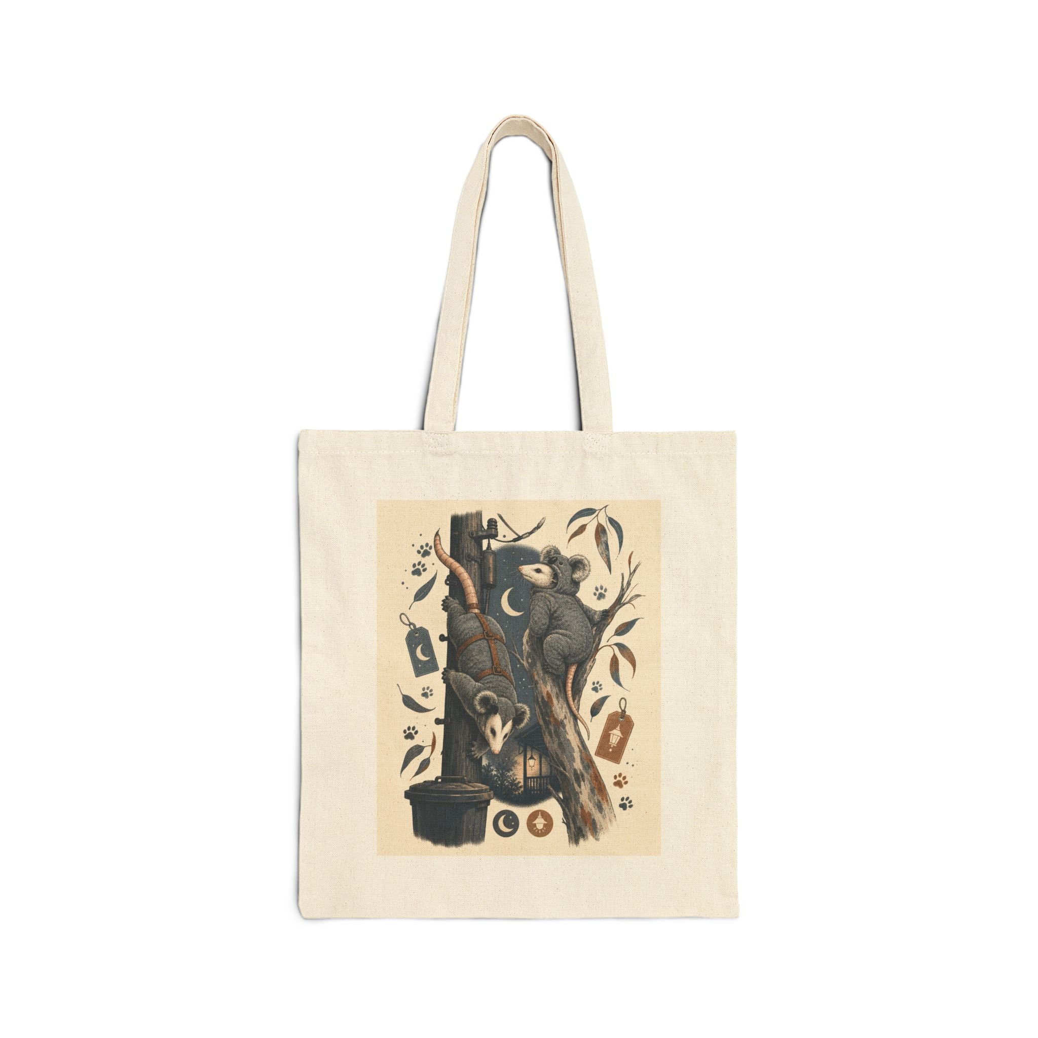 Opossum and koala canvas tote bag: an opossum playing dead beside a napping koala