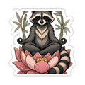 Lotus raccoon sticker: a raccoon in a seated meditation pose, die-cut weatherproof vinyl decal