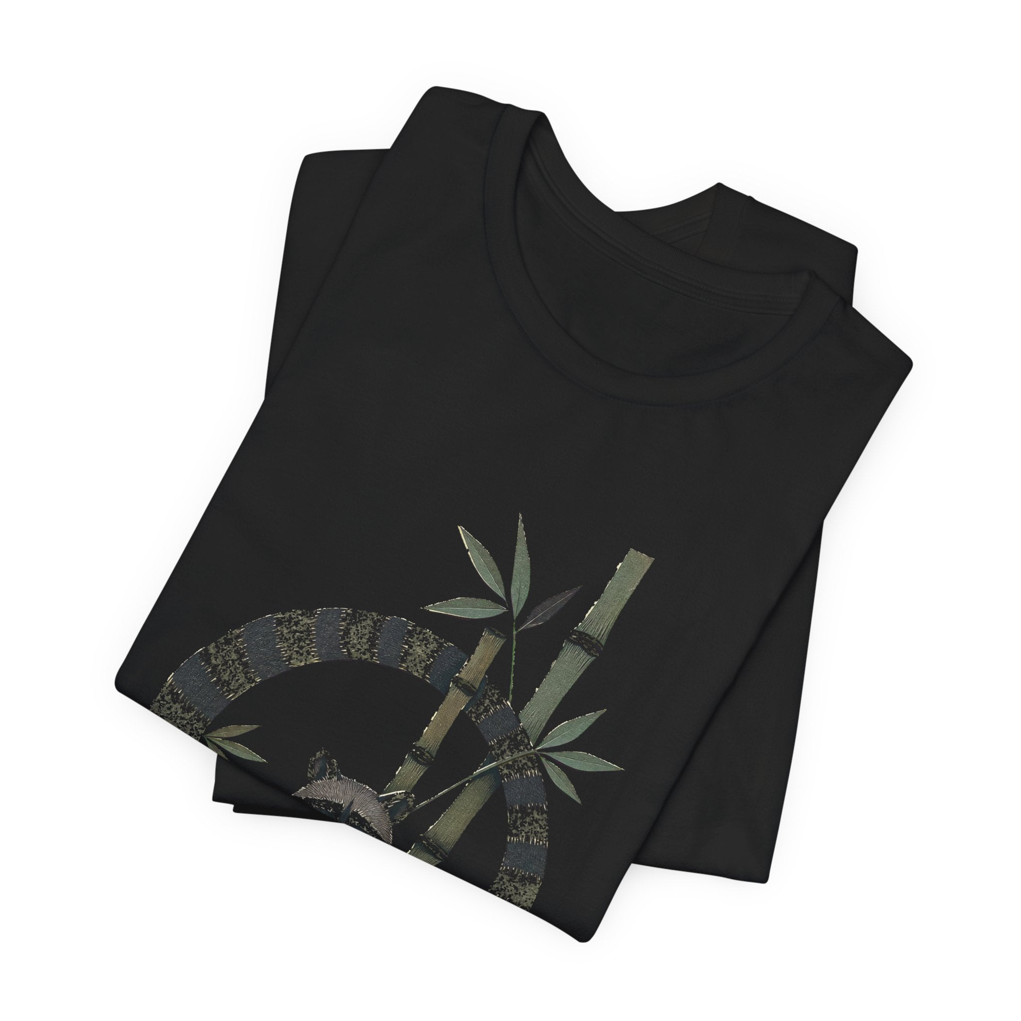 Zen raccoon t-shirt design detail: a raccoon meditating in a bamboo forest
